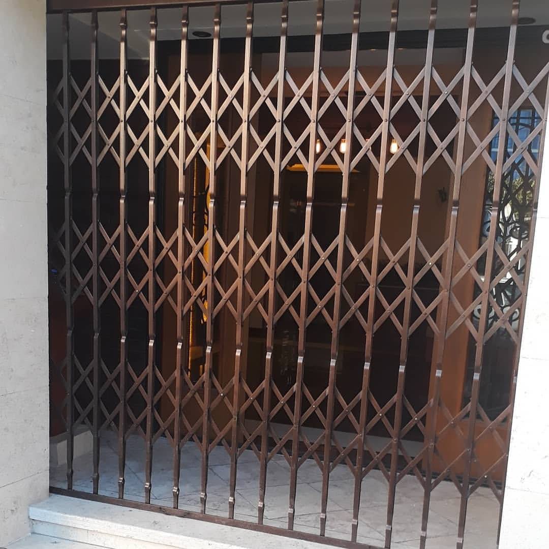 رنگ آمیزی درب محافظ آکاردئونی