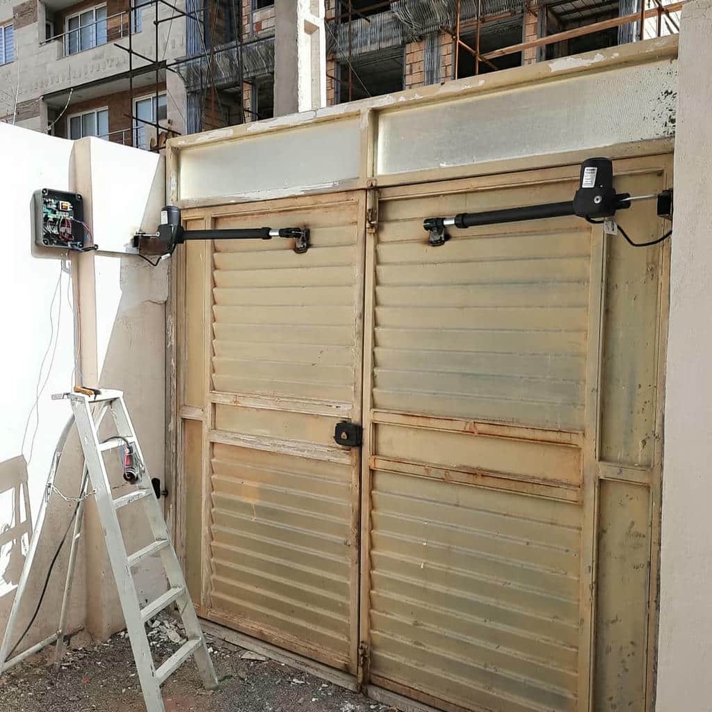 نصب جک درب پارکینگ تنظیم برد در قم
