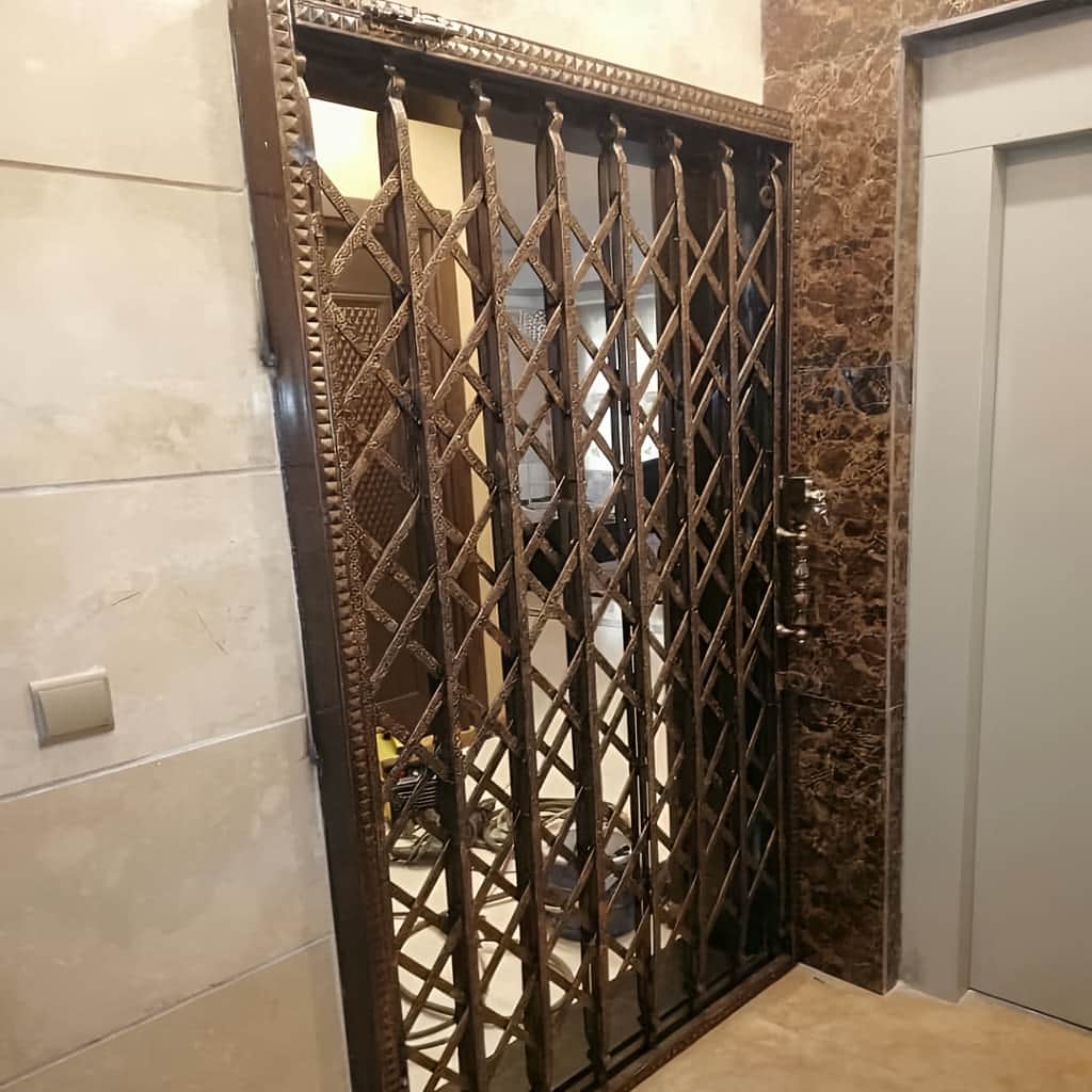 درب آکاردئونی ضد سرقت با فریم تراز