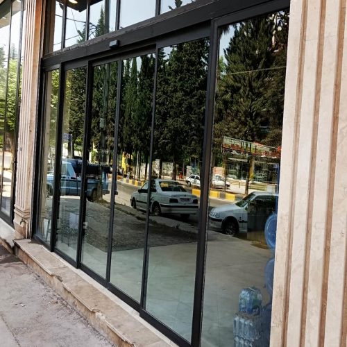 قیمت درب اتوماتیک شیشه ای منحنی لوکس