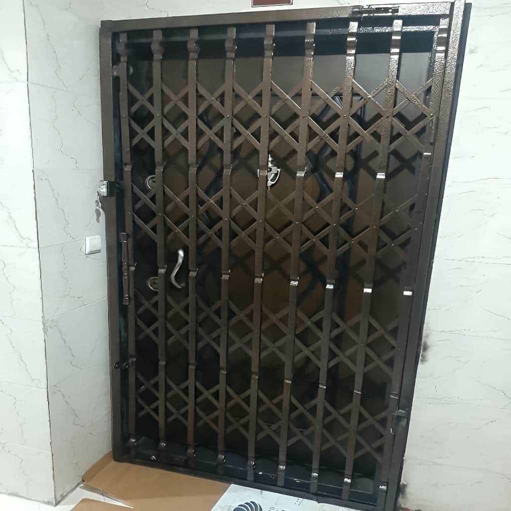 حفاظ آکاردئونی درب منزل