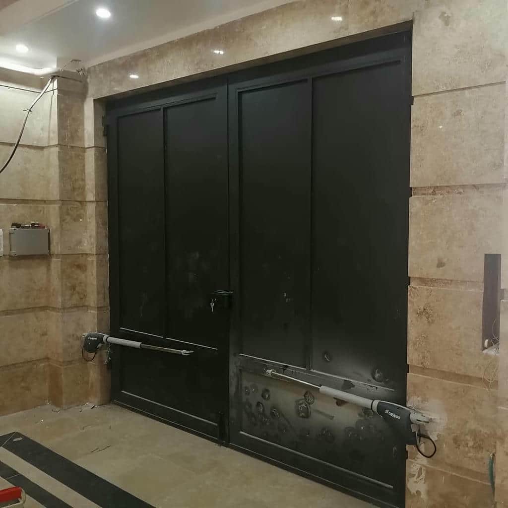 جک بازویی با موتور درب پارکینگ