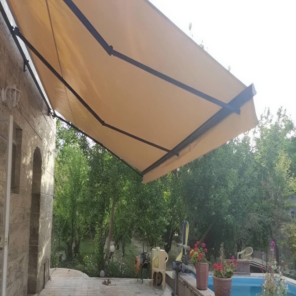 سایبان بازویی استان ایلام با پوشش کرم
